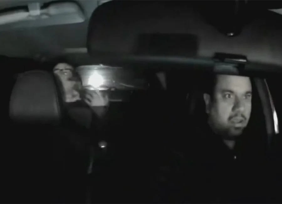 Dash-cam screenshot of an Uber driver